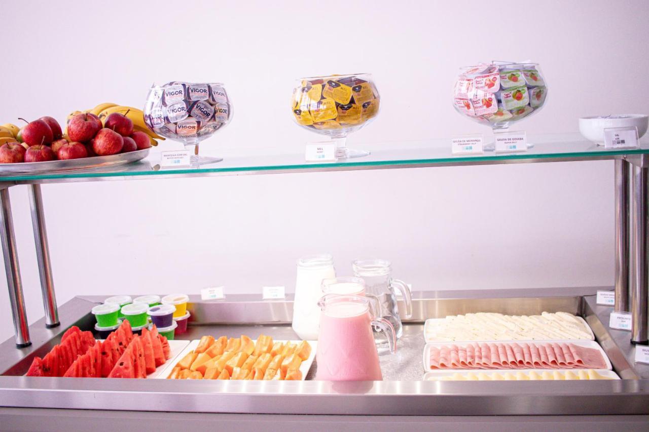 Hotel H2 Congonhas Congonhas  Exterior photo A buffet with cold cuts