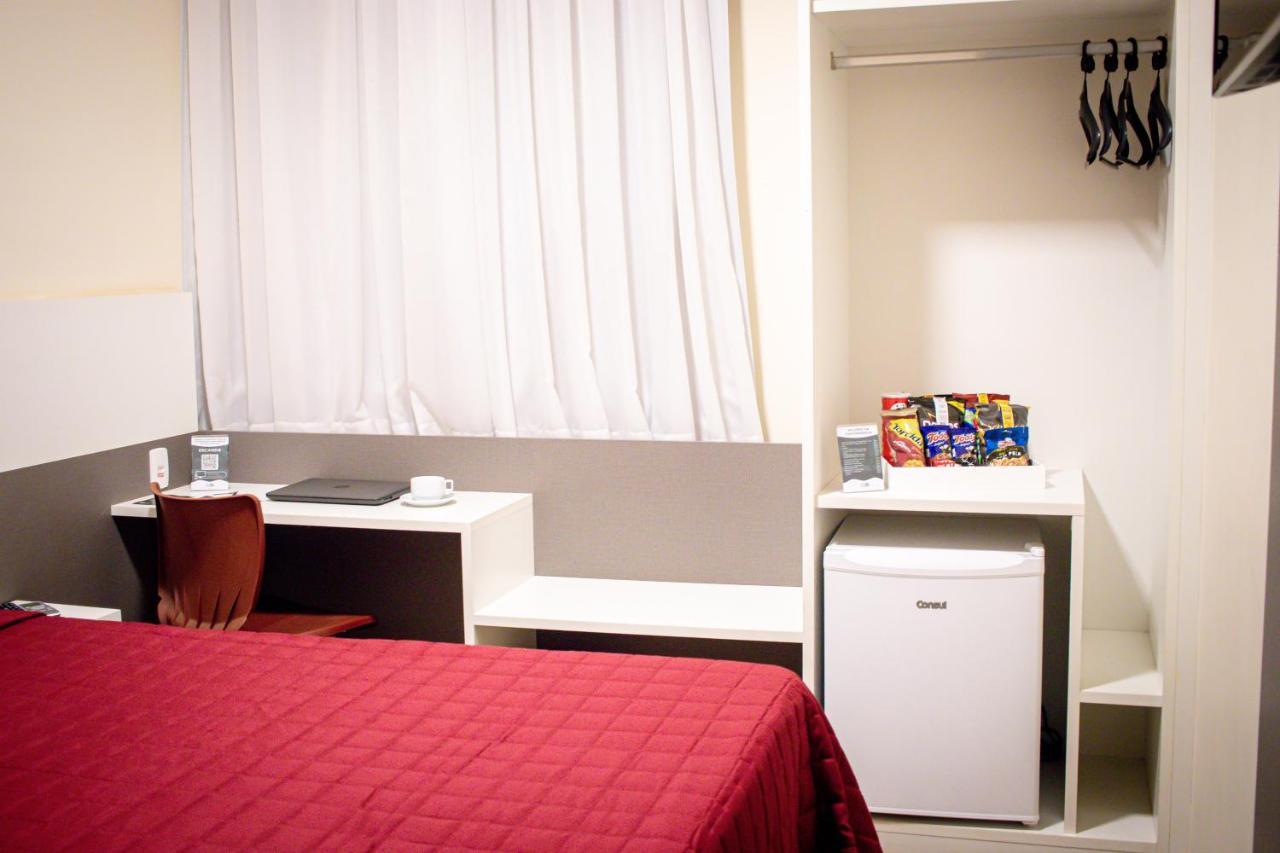 Hotel H2 Congonhas Congonhas  Exterior photo A typical room at a capsule hotel